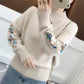 ✨Thick knitted jumper,🧵 adorned with floral embroidery 🍂